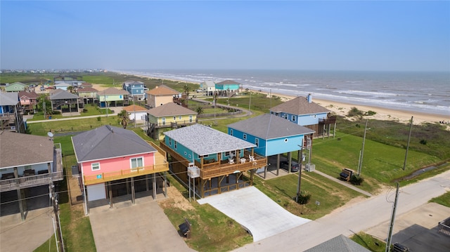 aerial view with a beach view and a water view