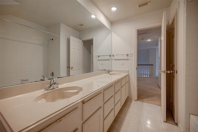 bathroom with vanity and tile patterned floors