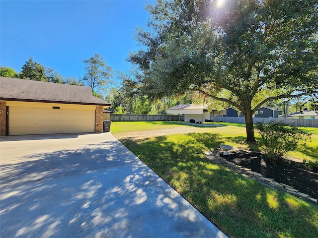 view of yard featuring a garage