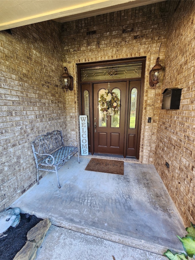 doorway to property featuring a porch