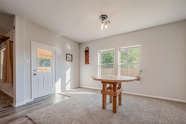 17624 Cedar Crest Dr, Conroe, TX 77306 - dining room featuring plenty of natural light, carpet, and wood finished floors
