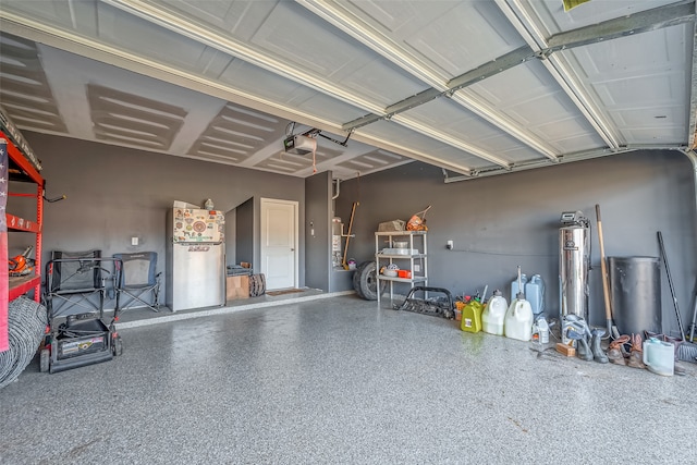 garage featuring a garage door opener