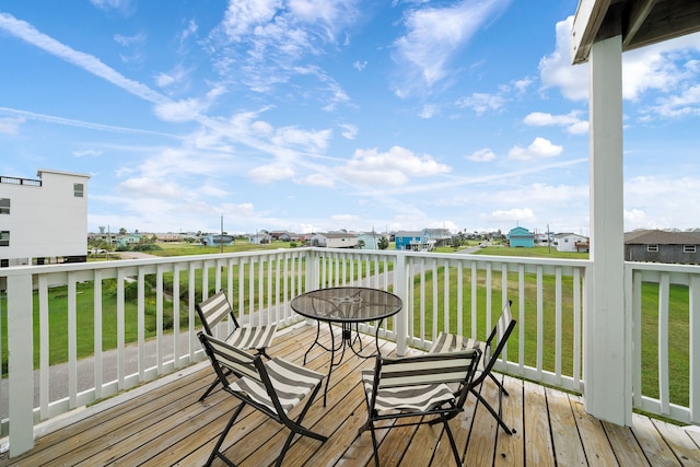 deck featuring a lawn