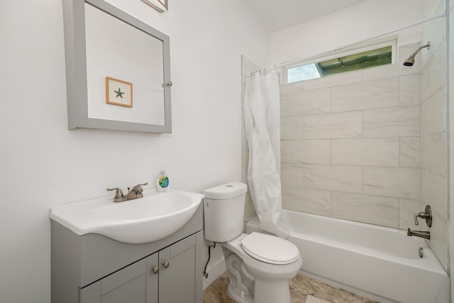 full bathroom with vanity, toilet, and shower / bath combo with shower curtain