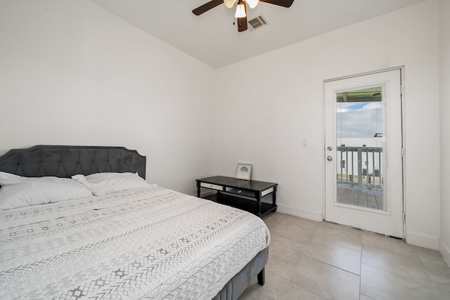 bedroom featuring light tile patterned floors, ceiling fan, and access to exterior