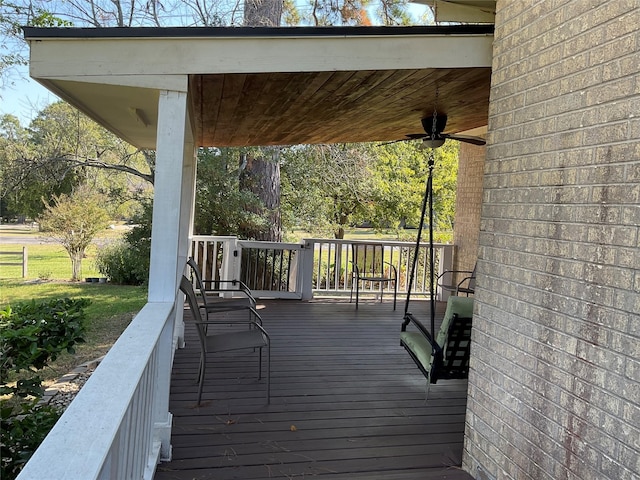 wooden deck with ceiling fan