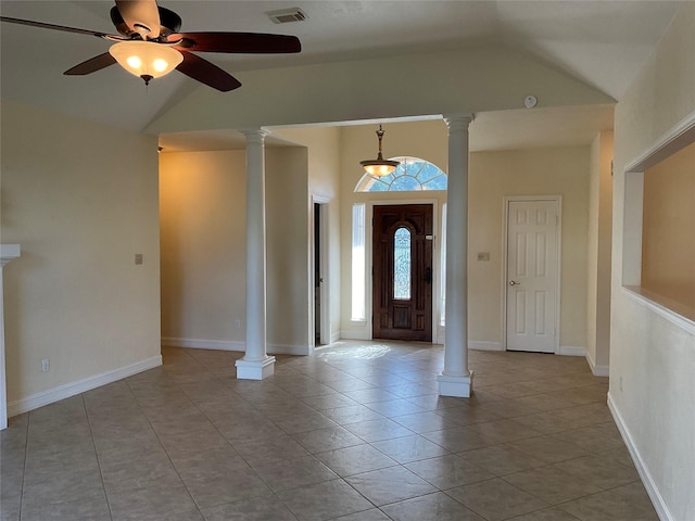 tiled foyer entrance featuring ceiling fan and lofted ceiling