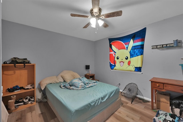 bedroom featuring ceiling fan and light wood-type flooring