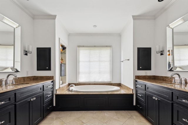 bathroom with a bathing tub, plenty of natural light, and ornamental molding