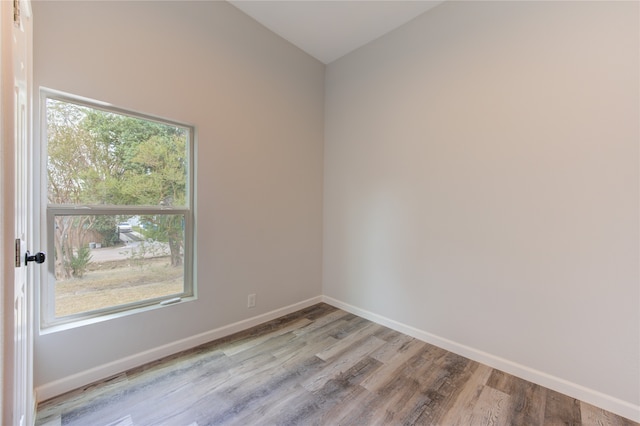 spare room with light wood-type flooring