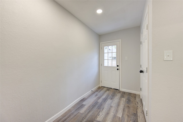 doorway with light hardwood / wood-style floors