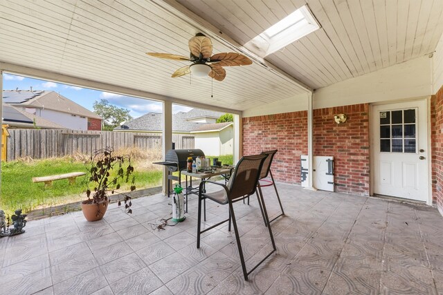 view of patio featuring ceiling fan