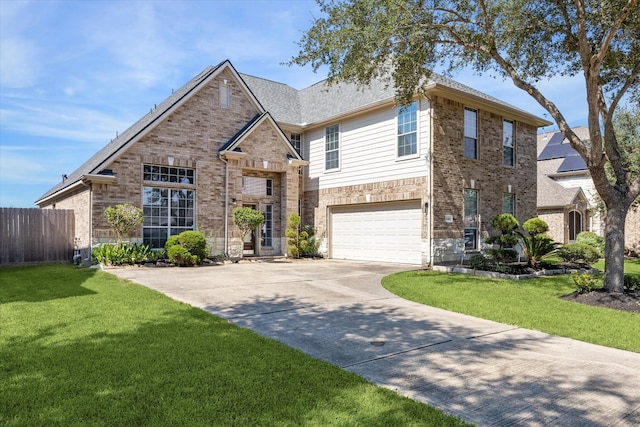 view of front facade featuring a garage and a front yard