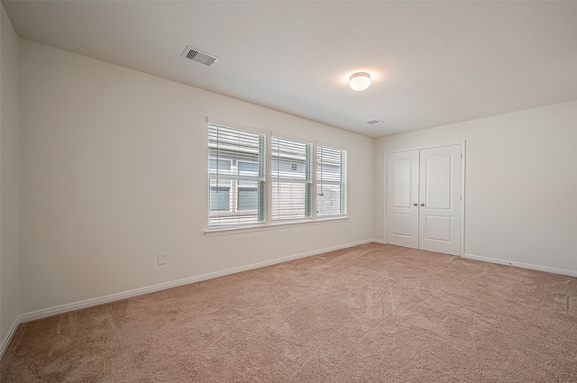 unfurnished room with carpet