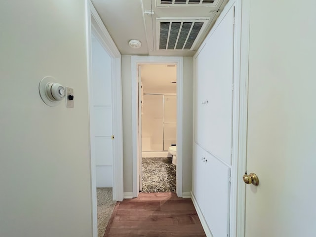 corridor featuring hardwood / wood-style flooring