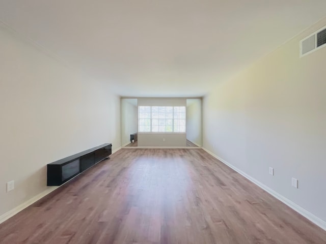 unfurnished living room featuring light hardwood / wood-style flooring