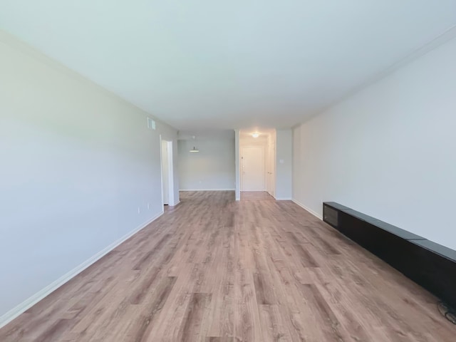 unfurnished room featuring light wood-type flooring