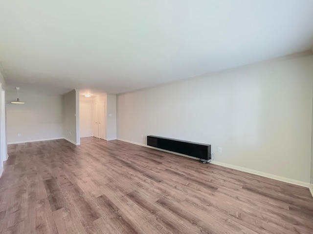 unfurnished living room featuring light wood-type flooring