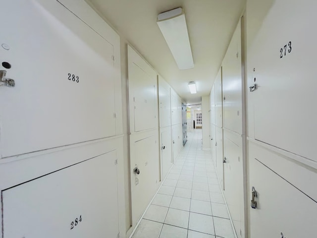 hallway with light tile patterned floors