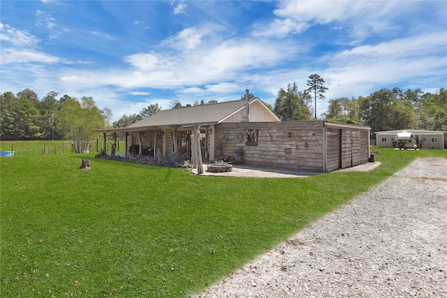 exterior space featuring a yard