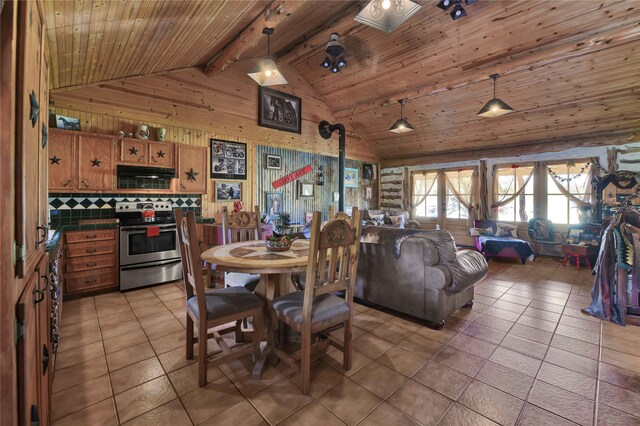 dining room with wooden ceiling, beam ceiling, tile patterned floors, and high vaulted ceiling