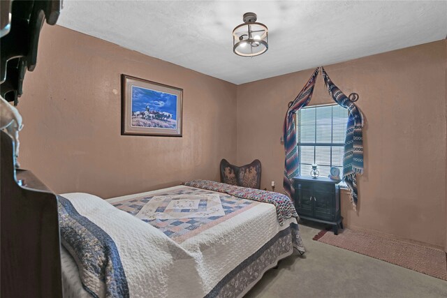 bedroom featuring carpet