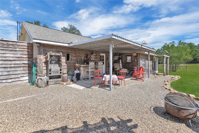 rear view of house featuring a patio area