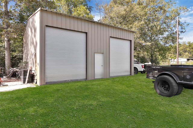 garage with a lawn