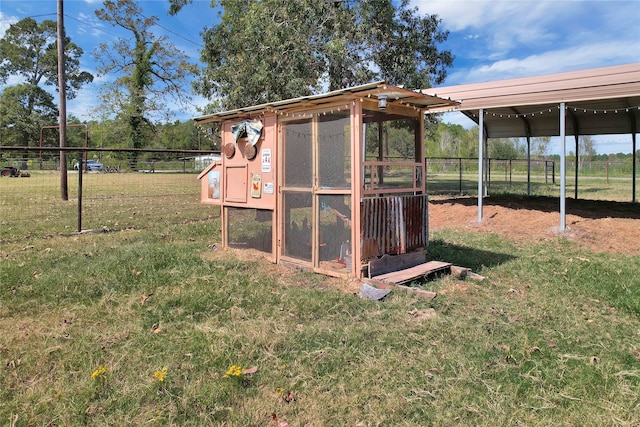 view of outdoor structure with a yard