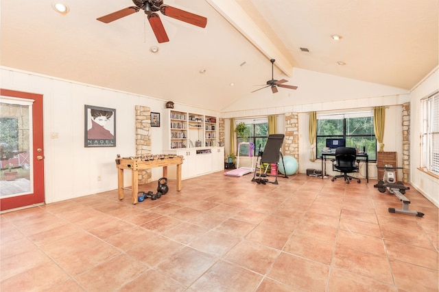 workout room with vaulted ceiling, ceiling fan, and light tile patterned floors