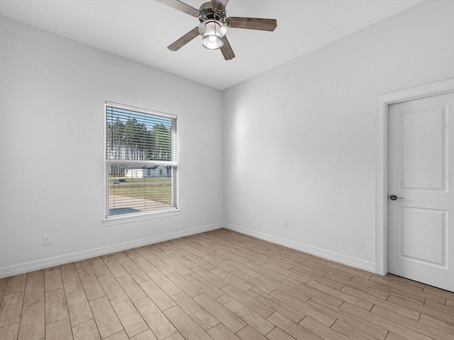 spare room featuring ceiling fan and light hardwood / wood-style flooring