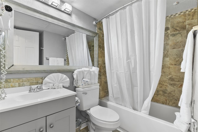 6102 Seawall Blvd Unit 294, Galveston, TX 77551 - bathroom with shower / bath combo with shower curtain, vanity, and toilet