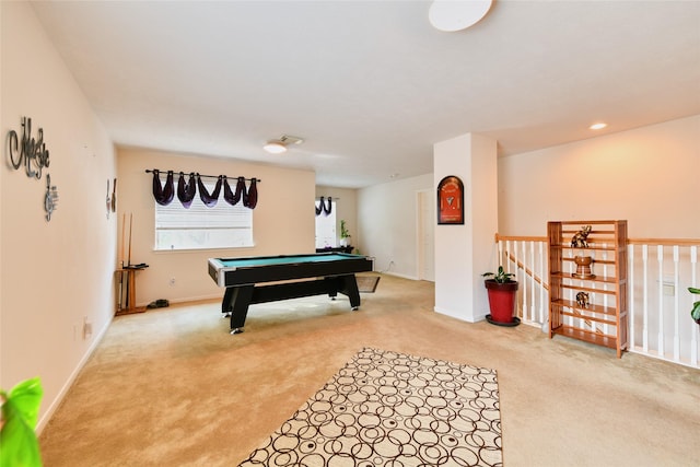 recreation room featuring pool table, baseboards, and light carpet