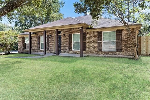 exterior space featuring a lawn