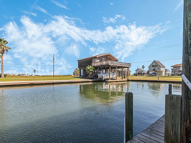 dock area with a water view