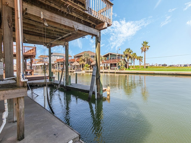 dock area with a water view