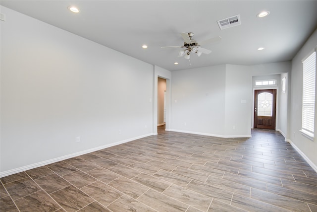 interior space featuring ceiling fan