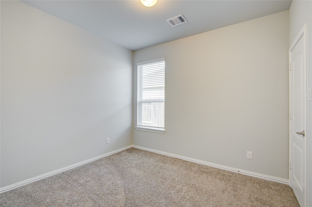 empty room featuring carpet