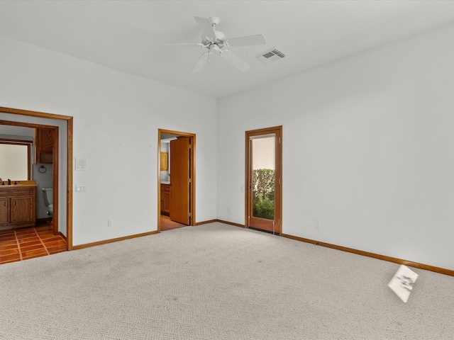 unfurnished room with ceiling fan and light carpet