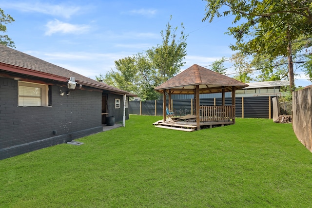 view of yard with a gazebo and a deck