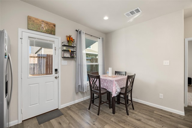 22107 King Heights Ln, Houston, TX 77073 - dining area with visible vents, baseboards, recessed lighting, and wood finished floors