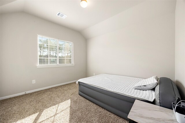 22107 King Heights Ln, Houston, TX 77073 - bedroom featuring baseboards, vaulted ceiling, visible vents, and carpet floors