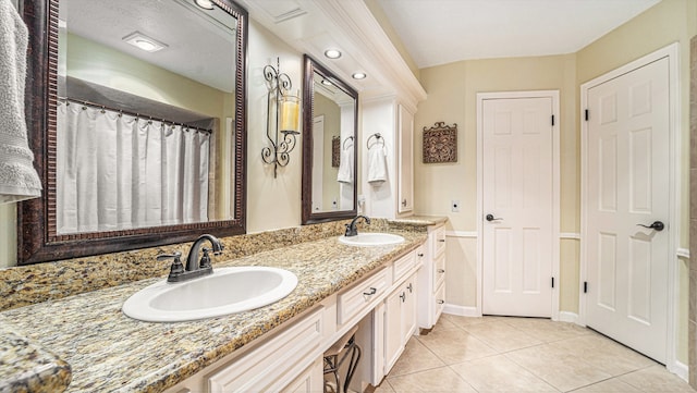 bathroom featuring vanity and tile patterned floors