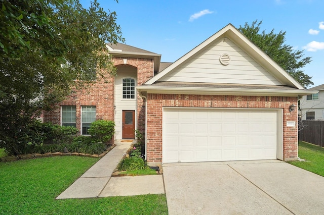 view of front facade with a front lawn and a garage