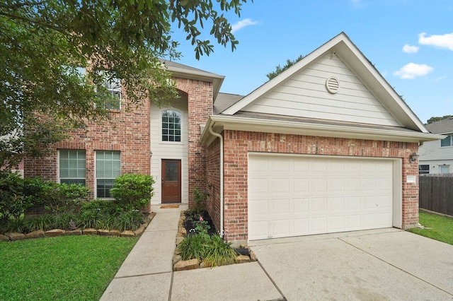 view of front of house with a front lawn and a garage