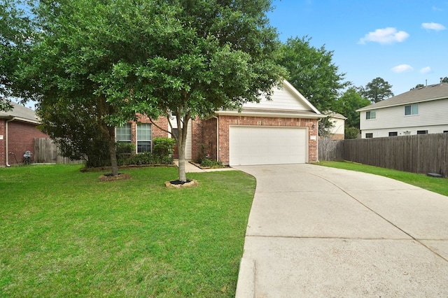 view of front facade with a garage and a front lawn