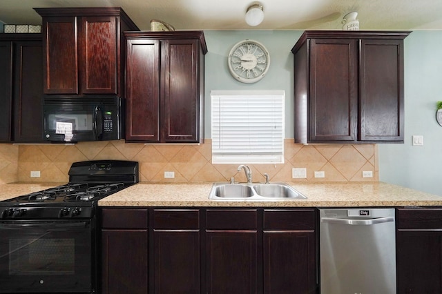 kitchen with sink, decorative backsplash, and black appliances