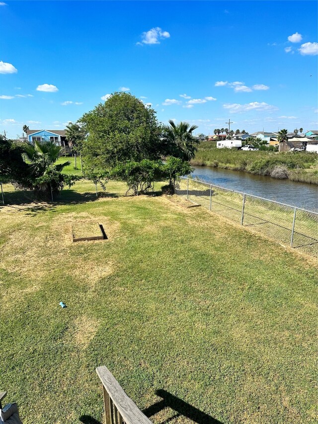 view of yard with a water view