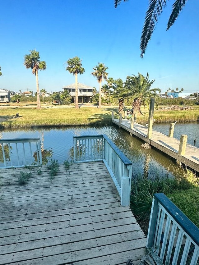 dock area featuring a water view