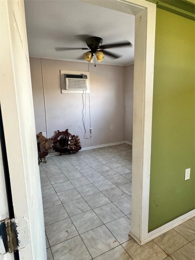 unfurnished room featuring ceiling fan and a wall mounted air conditioner